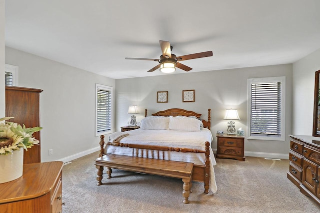 329 S Stone Ridge Dr, Lake Geneva, WI 53147 - bedroom featuring light carpet and a ceiling fan