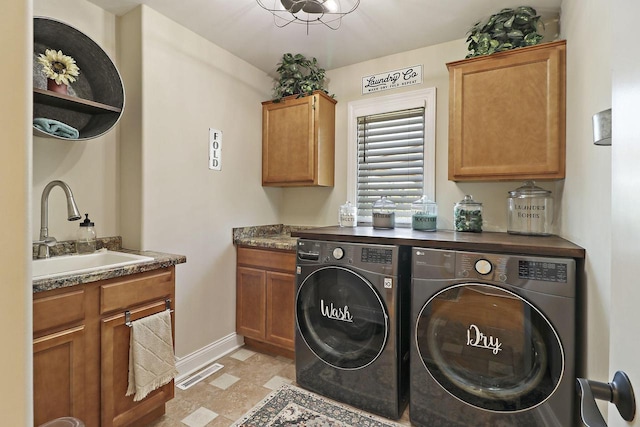 329 S Stone Ridge Dr, Lake Geneva, WI 53147 - laundry area with washer and clothes dryer and cabinet space