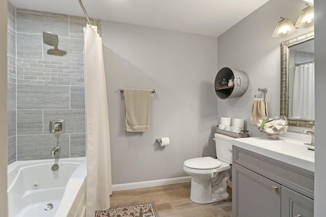 329 S Stone Ridge Dr, Lake Geneva, WI 53147 - bathroom with wood finished floors, vanity, and a combined bath / shower with jetted tub