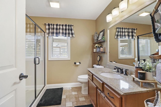 329 S Stone Ridge Dr, Lake Geneva, WI 53147 - full bath with a shower stall, vanity, and stone finish flooring