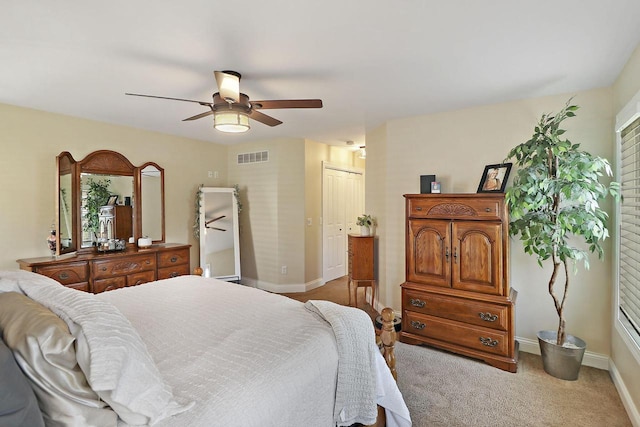 329 S Stone Ridge Dr, Lake Geneva, WI 53147 - bedroom with carpet floors, ceiling fan, a closet, and multiple windows