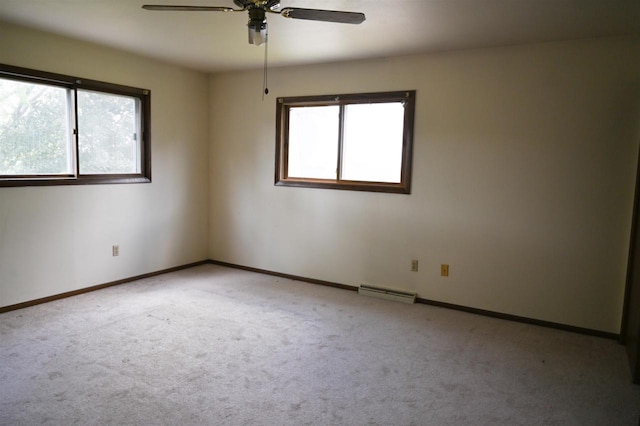 5905-5907 Rattman Rd, Madison, WI 53718 - carpeted empty room featuring healthy amount of natural light and ceiling fan