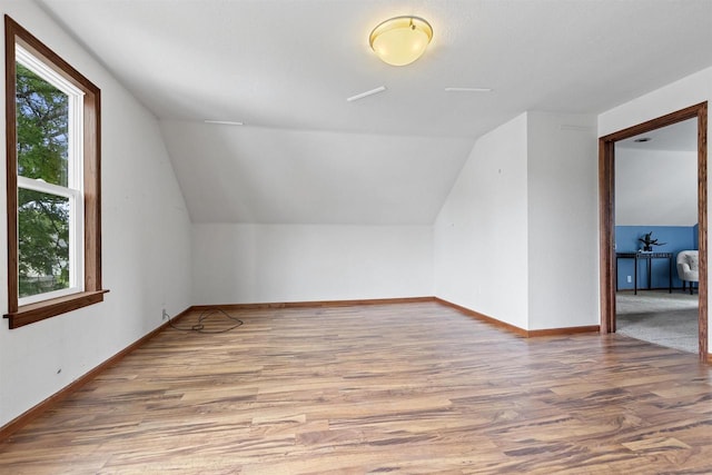 914 W 5th Ave, Oshkosh, WI 54902 - bonus room with wood finished floors, plenty of natural light, and lofted ceiling