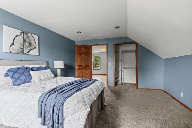 914 W 5th Ave, Oshkosh, WI 54902 - carpeted bedroom with lofted ceiling and baseboards