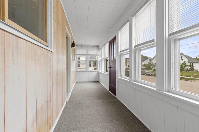 914 W 5th Ave, Oshkosh, WI 54902 - corridor with carpet floors and wooden walls