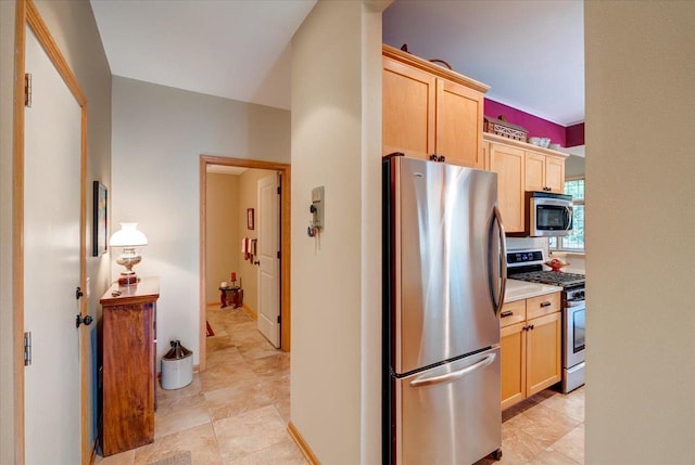 14 Wood Brook Way, Fitchburg, WI 53711 - kitchen featuring stainless steel appliances, light brown cabinets, and light countertops
