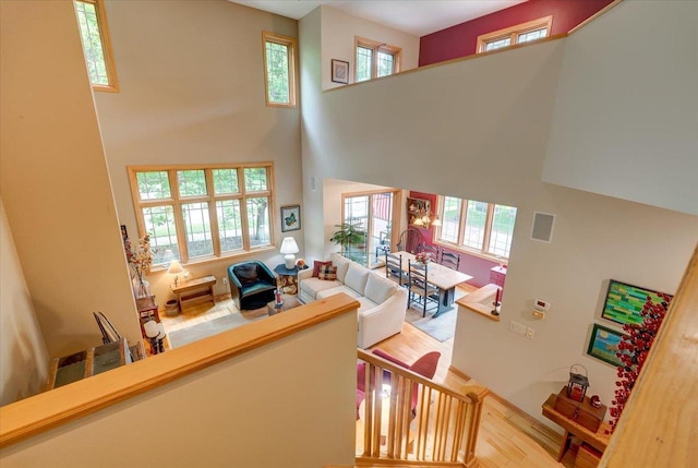 14 Wood Brook Way, Fitchburg, WI 53711 - living room featuring a towering ceiling and wood finished floors