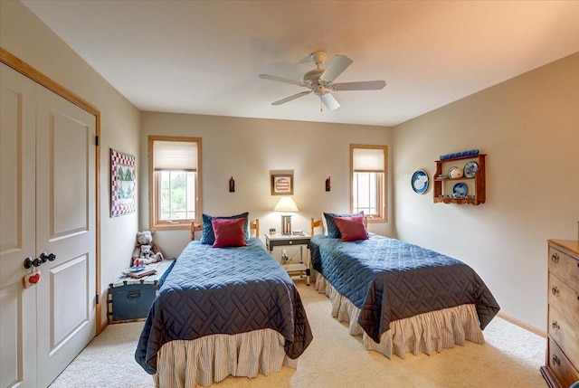 14 Wood Brook Way, Fitchburg, WI 53711 - bedroom with multiple windows, light colored carpet, and a ceiling fan