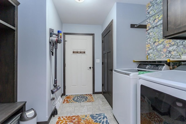 8810 Hinner Springs Dr, Weston, WI 54476 - washroom featuring separate washer and dryer and cabinet space