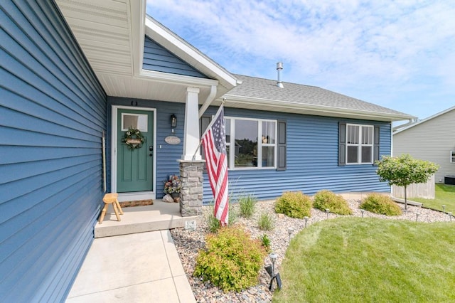 8810 Hinner Springs Dr, Weston, WI 54476 - entrance to property with a lawn and roof with shingles