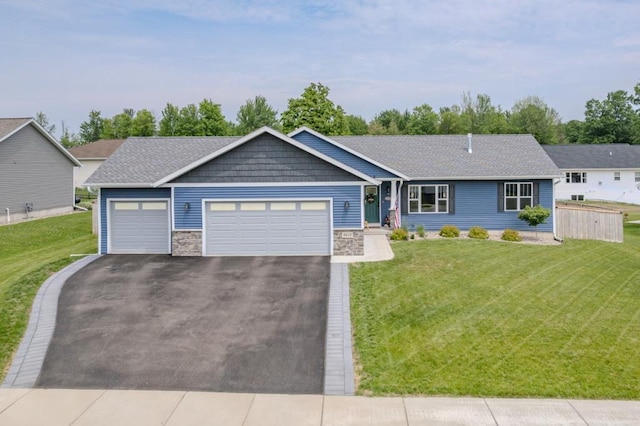 8810 Hinner Springs Dr, Weston, WI 54476 - ranch-style house with an attached garage, driveway, stone siding, and a shingled roof