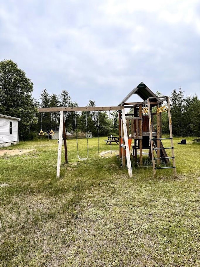 691 Valley Trl, Nekoosa, WI 54457 - view of jungle gym featuring a lawn