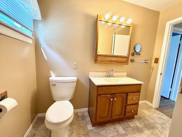 1710 N 25th St, Sheboygan, WI 53081 - bathroom featuring vanity and toilet
