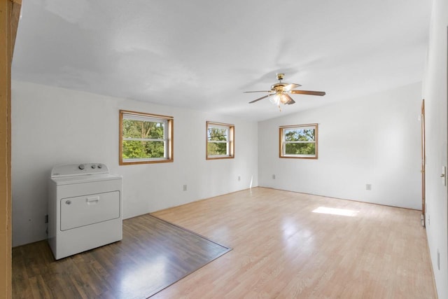 226 Winnebago Ave, Portage, WI 53901 - spare room featuring washer / dryer, wood finished floors, and a ceiling fan