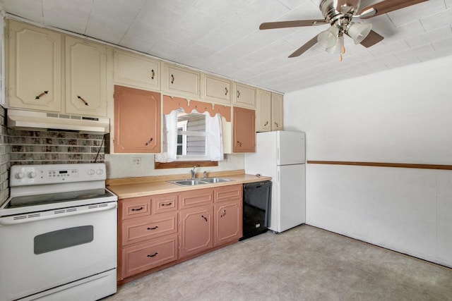 226 Winnebago Ave, Portage, WI 53901 - kitchen with white appliances, under cabinet range hood, cream cabinets, light countertops, and a ceiling fan