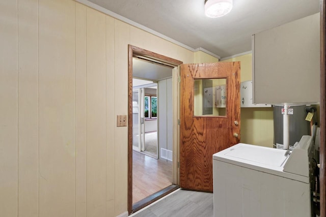 226 Winnebago Ave, Portage, WI 53901 - washroom with light wood-type flooring and crown molding