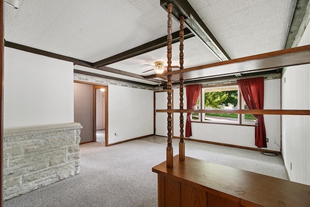 226 Winnebago Ave, Portage, WI 53901 - basement with carpet floors, a textured ceiling, and a ceiling fan