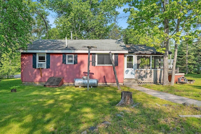 N11134 Nelson Rd, Athelstane, WI 54104 - rear view of property featuring a yard, cooling unit, and a shingled roof