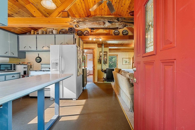 N11134 Nelson Rd, Athelstane, WI 54104 - kitchen with white appliances and a wooden ceiling with exposed beams