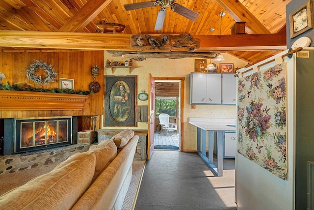 N11134 Nelson Rd, Athelstane, WI 54104 - living room featuring wood ceiling, ceiling fan, a glass covered fireplace, light carpet, and wood walls