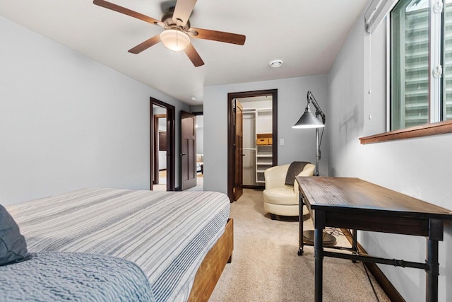 6600 N Kurey Dr, Appleton, WI 54913 - bedroom featuring light carpet, a spacious closet, a closet, and ceiling fan