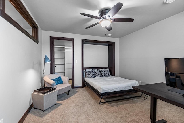 6600 N Kurey Dr, Appleton, WI 54913 - carpeted bedroom with baseboards and a ceiling fan