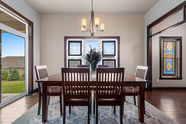 6600 N Kurey Dr, Appleton, WI 54913 - dining area featuring hardwood / wood-style floors and a chandelier
