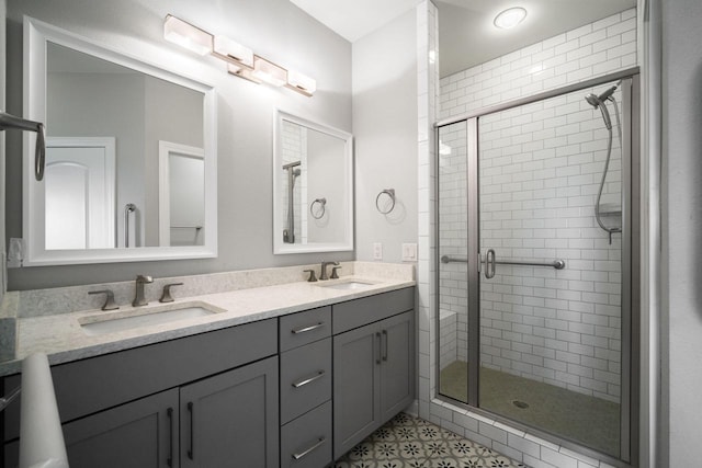 2701 Esker Dr, West Bend, WI 53095 - full bath featuring a shower stall and double vanity