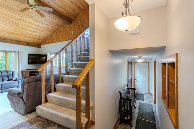 1340 Deer Brook Ct, Wausau, WI 54401 - stairway with a wood ceiling with exposed beams, a ceiling fan, and high vaulted ceiling