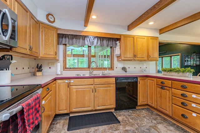 1340 Deer Brook Ct, Wausau, WI 54401 - kitchen with stainless steel appliances, beam ceiling, plenty of natural light, tasteful backsplash, and light countertops