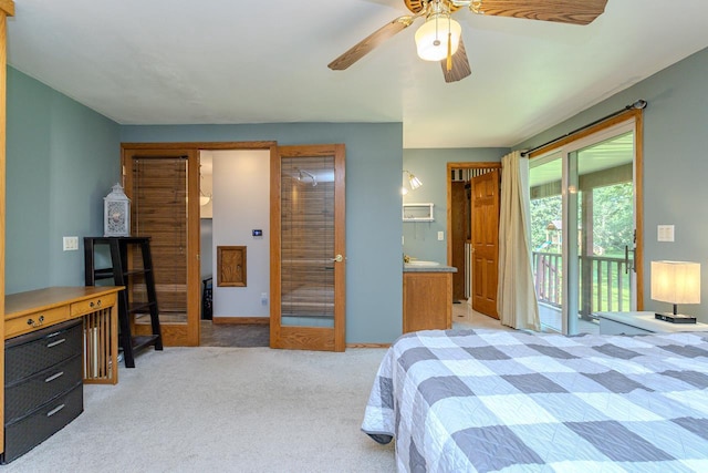 1340 Deer Brook Ct, Wausau, WI 54401 - bedroom with access to exterior, light carpet, and a ceiling fan