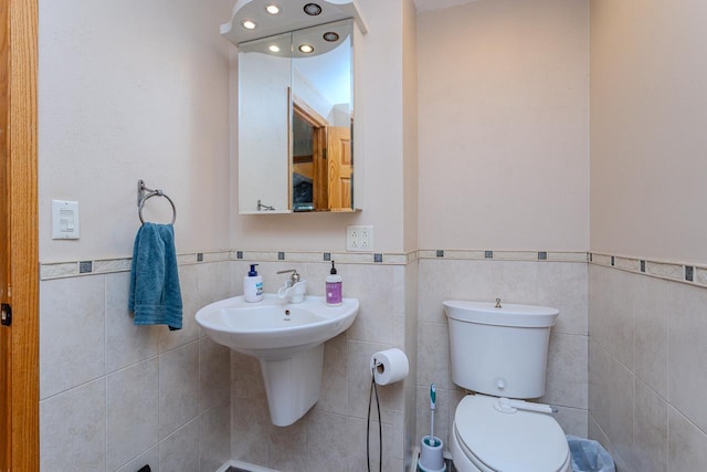 1340 Deer Brook Ct, Wausau, WI 54401 - bathroom with tile walls and wainscoting