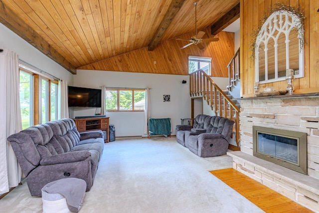 1340 Deer Brook Ct, Wausau, WI 54401 - living area with stairway, a ceiling fan, a fireplace, carpet floors, and wood ceiling