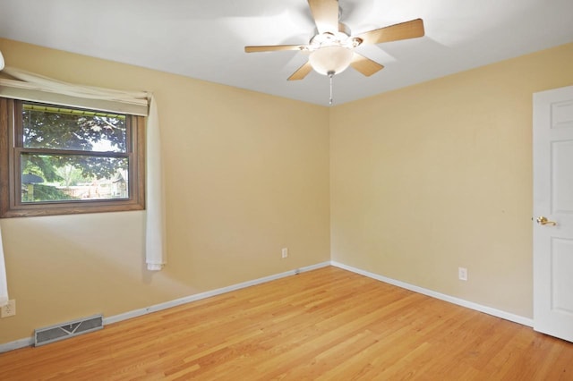 8074 48th Ave, Kenosha, WI 53142 - unfurnished room with light wood-style floors and ceiling fan