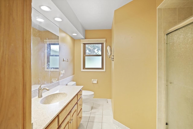 8074 48th Ave, Kenosha, WI 53142 - bathroom featuring vanity, a stall shower, tile patterned floors, and recessed lighting