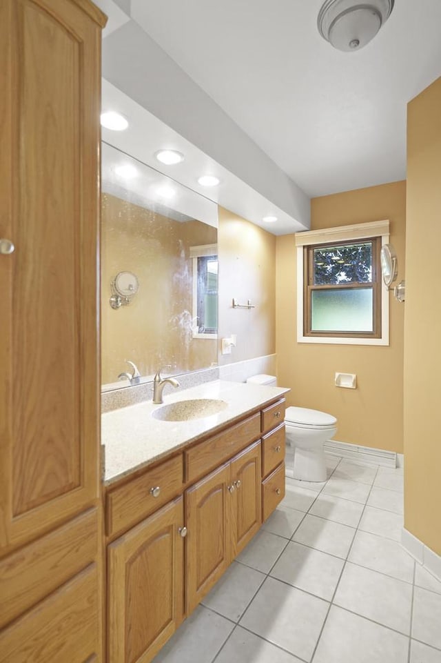 8074 48th Ave, Kenosha, WI 53142 - bathroom featuring tile patterned floors and vanity