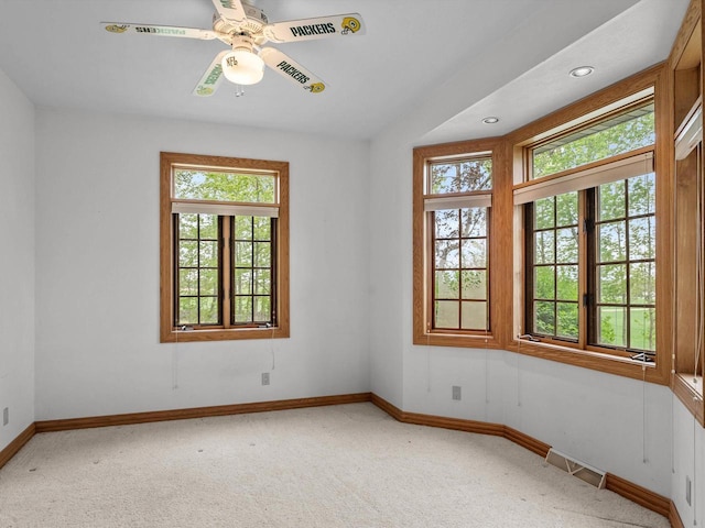 4228 County Hwy W, Valders, WI 54245 - unfurnished room with light carpet, ceiling fan, and recessed lighting