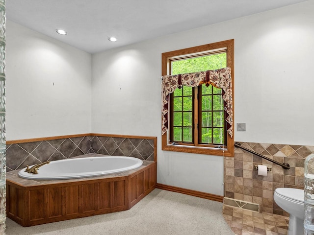 4228 County Hwy W, Valders, WI 54245 - full bath with tile walls, a bath, wainscoting, and recessed lighting