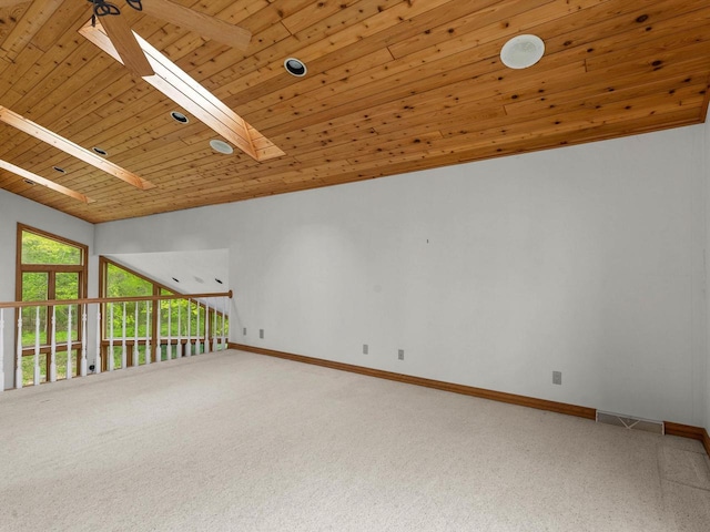 4228 County Hwy W, Valders, WI 54245 - empty room featuring a skylight, wood ceiling, carpet, and lofted ceiling