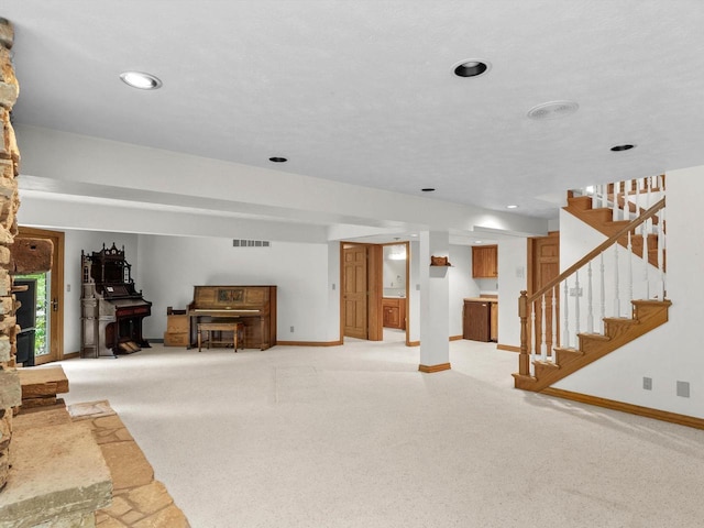4228 County Hwy W, Valders, WI 54245 - unfurnished living room featuring stairs and recessed lighting