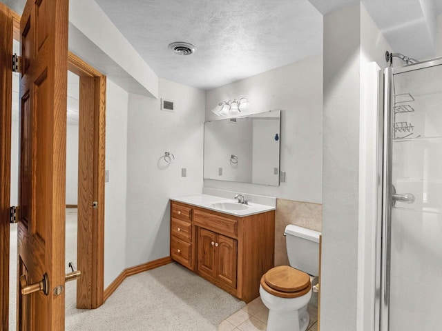 4228 County Hwy W, Valders, WI 54245 - bathroom with a shower stall, vanity, and a textured ceiling