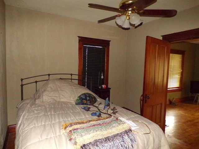 208 S Walker St, Wautoma, WI 54982 - bedroom with wood finished floors and ceiling fan