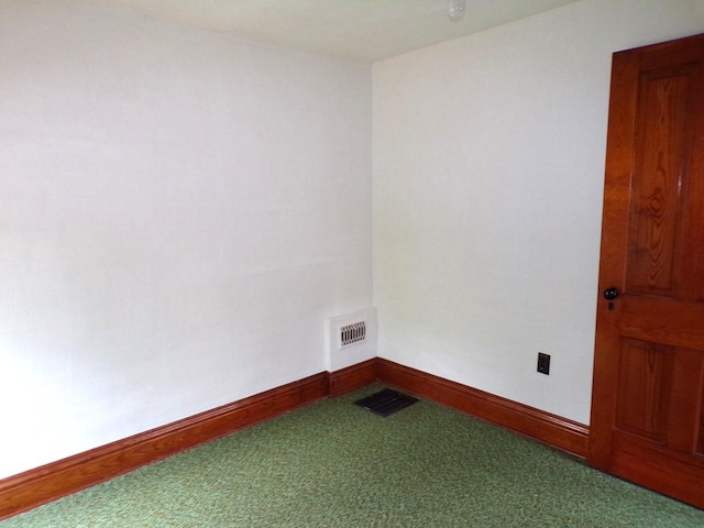 208 S Walker St, Wautoma, WI 54982 - carpeted empty room with baseboards