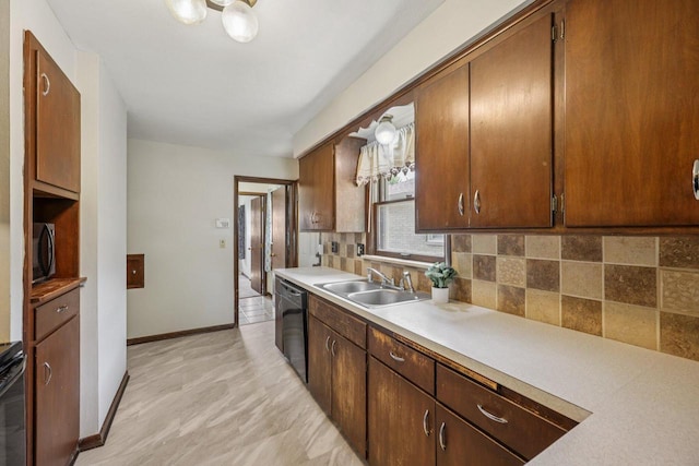 3838 N 78th St, Milwaukee, WI 53222 - kitchen featuring black appliances, light countertops, and tasteful backsplash