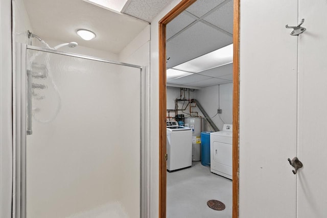 3716 County Rd Unit B, Mcfarland, WI 53558 - full bathroom featuring washer and dryer, concrete floors, a stall shower, and water heater