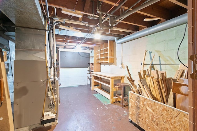 3716 County Rd Unit B, Mcfarland, WI 53558 - unfinished below grade area with a workshop area and concrete block wall