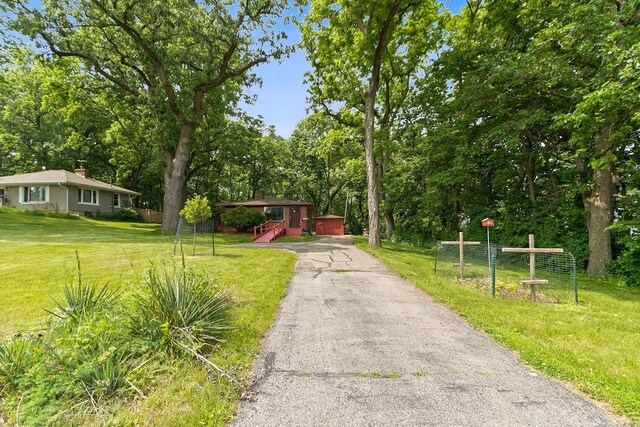 3716 County Rd Unit B, Mcfarland, WI 53558 - view of front facade featuring a front lawn and driveway