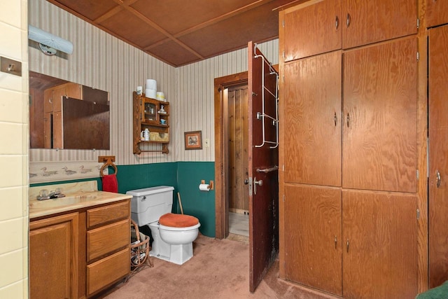 8950 Pine Ln, Fremont, WI 54940 - bathroom with vanity and wallpapered walls