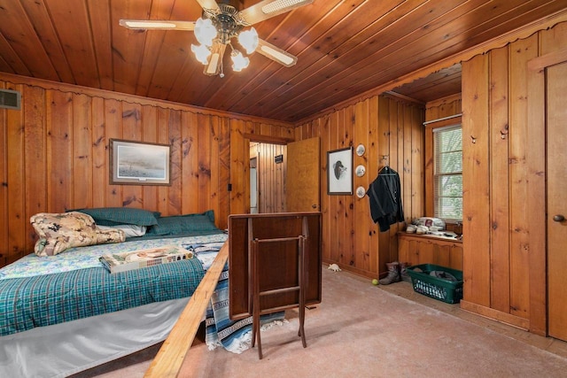 8950 Pine Ln, Fremont, WI 54940 - carpeted bedroom with wooden ceiling and wooden walls