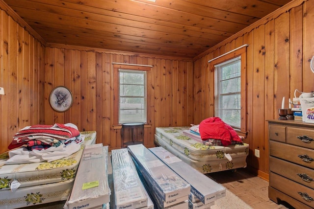 8950 Pine Ln, Fremont, WI 54940 - bedroom with wood ceiling, light wood finished floors, and wood walls